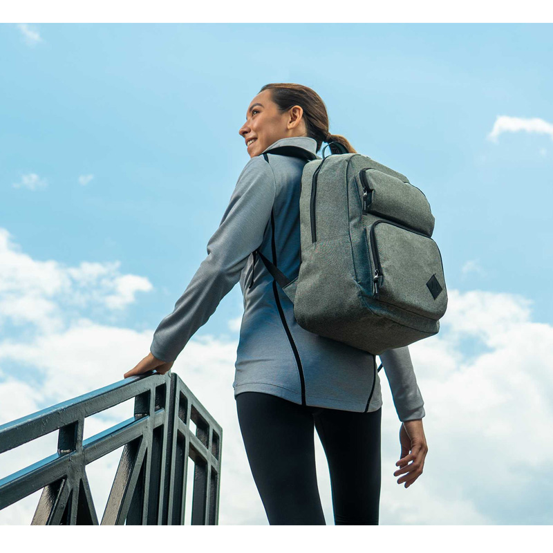 model with laptop backpack